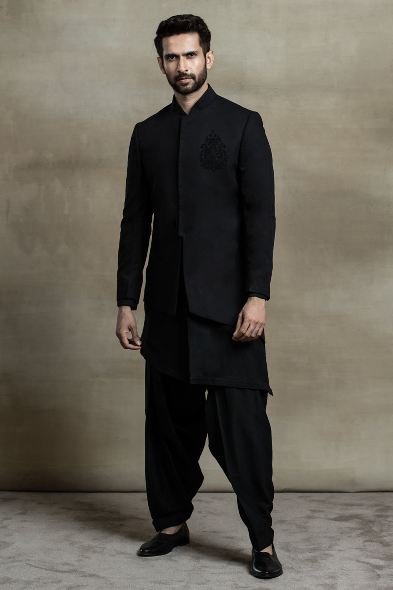 Asymmetric jacket paired with kurta and salwar